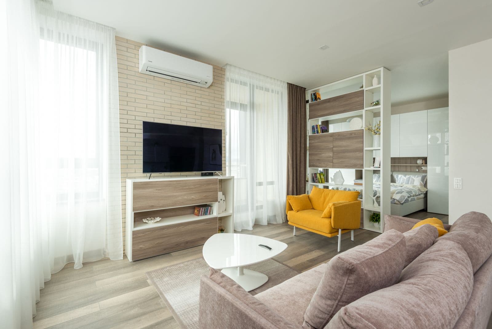 Trusted AC service for Mumbai homes Bright Mumbai living room kept cool by a split AC